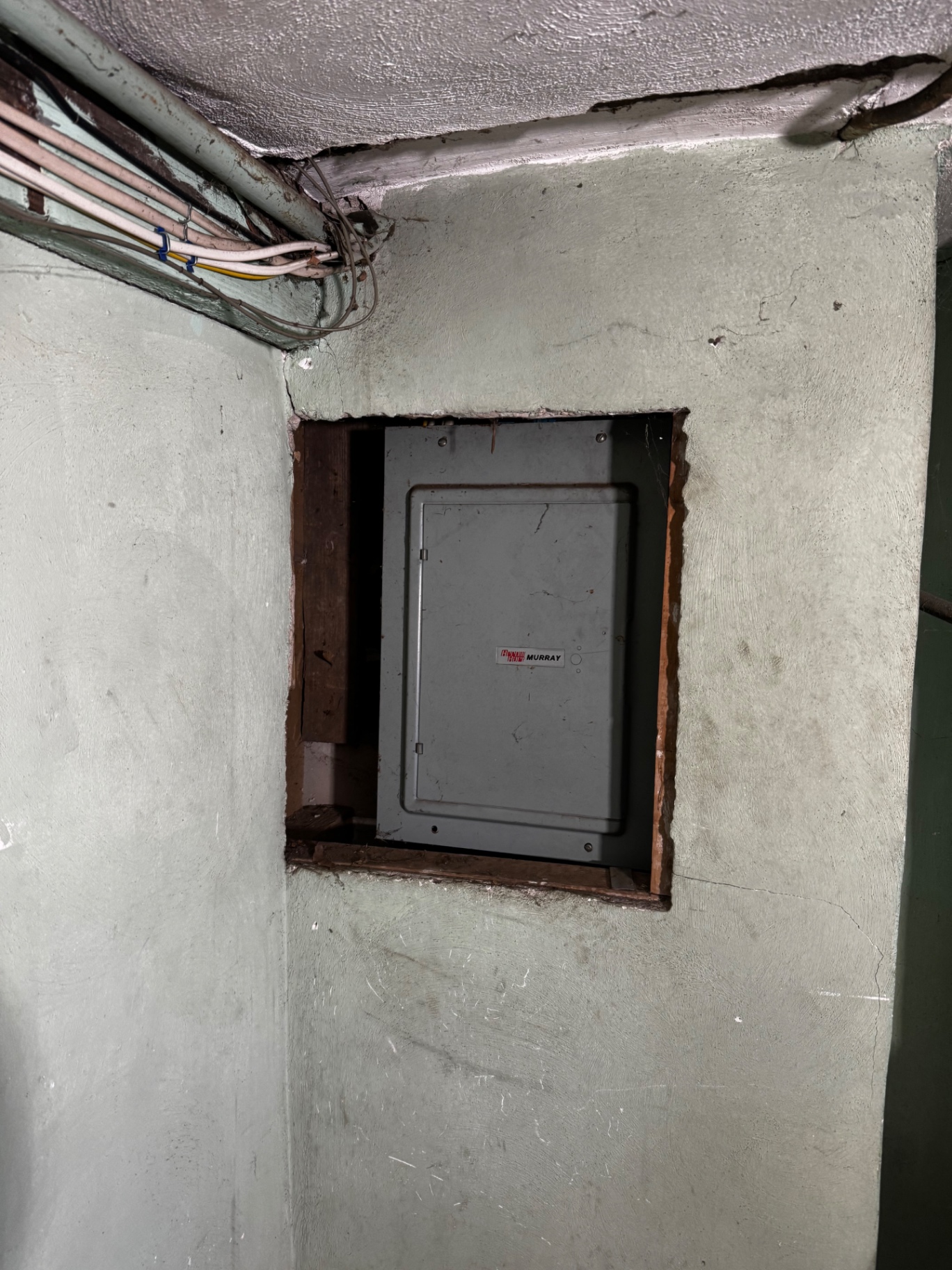 Original residential electrical panel before replacement