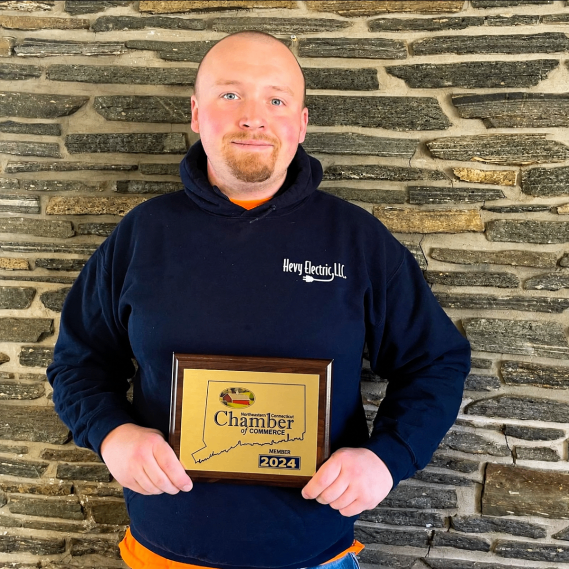 Edward Hevy receiving a Northeastern Connecticut Chamber of Commerce membership award