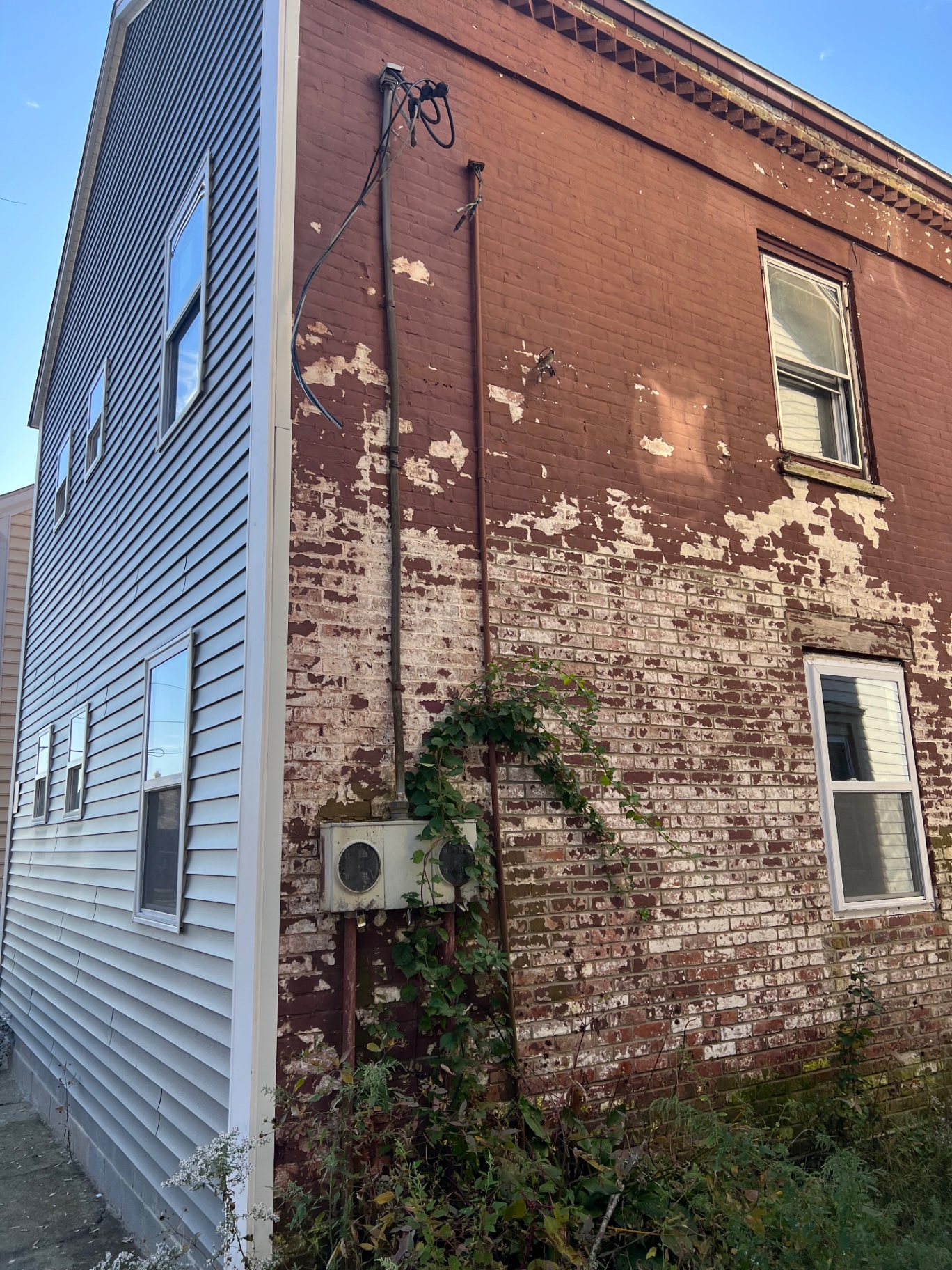 Original electrical service on a brick home
