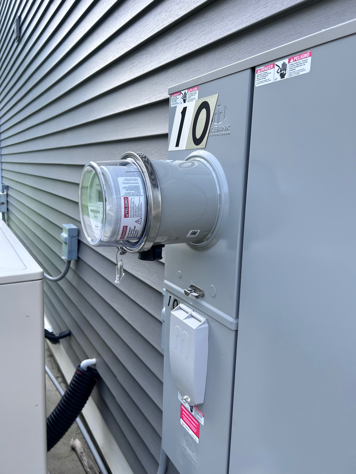 Close view of a residential electrical meter socket