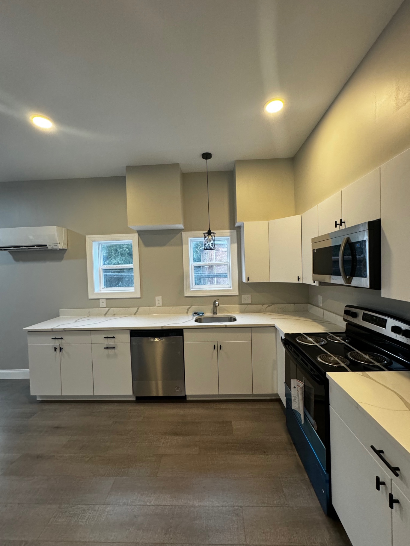 Finished kitchen with recessed ceiling lighting